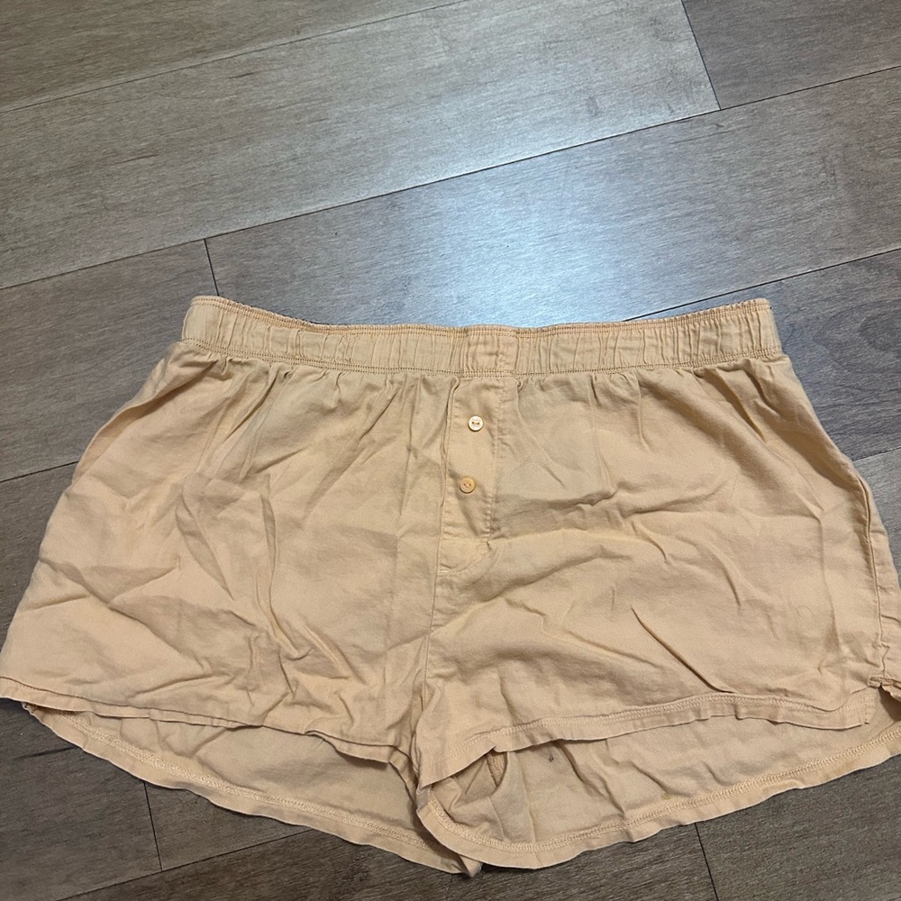 PINK Halloween orange pajama shorts with ghosts on back.